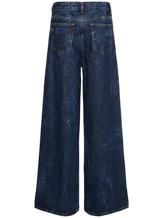 GANNI Crinkled denim jeans