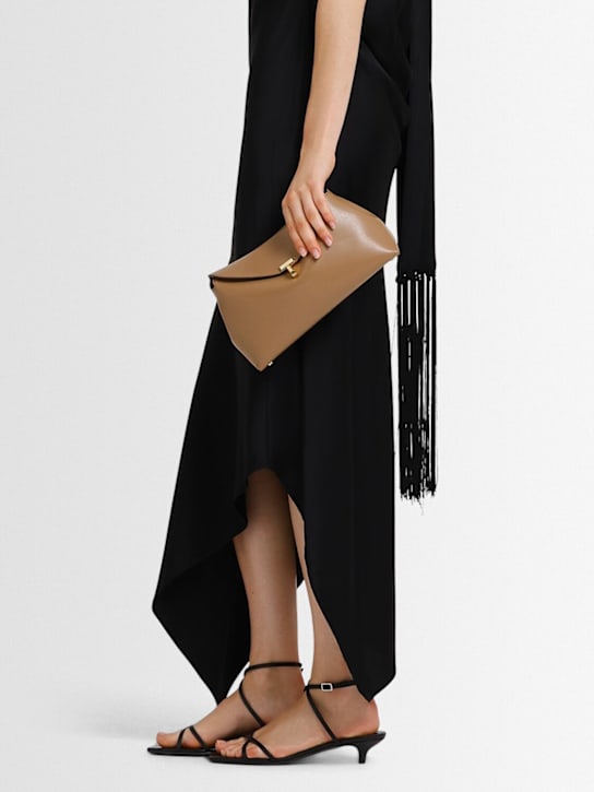 Toteme T-Lock palmellata leather clutch