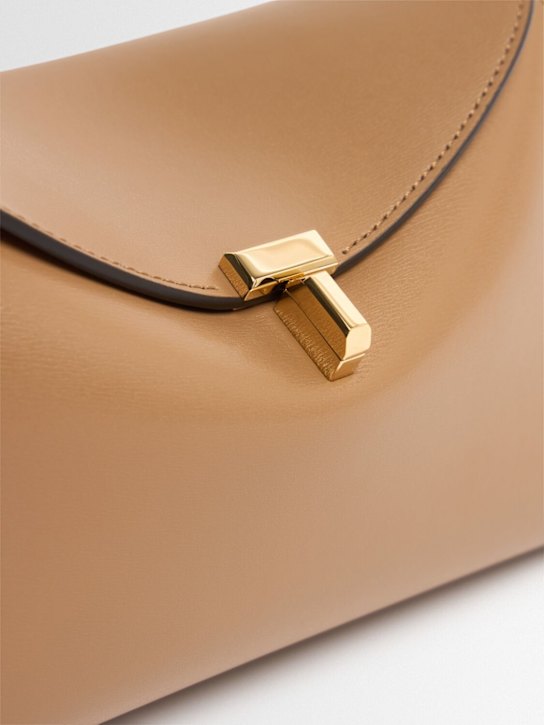 Toteme T-Lock palmellata leather clutch