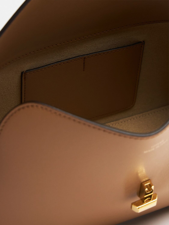 Toteme T-Lock palmellata leather clutch