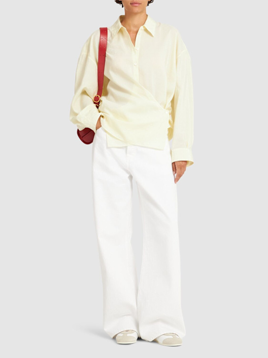 Frame The loose cotton mid rise wide jeans