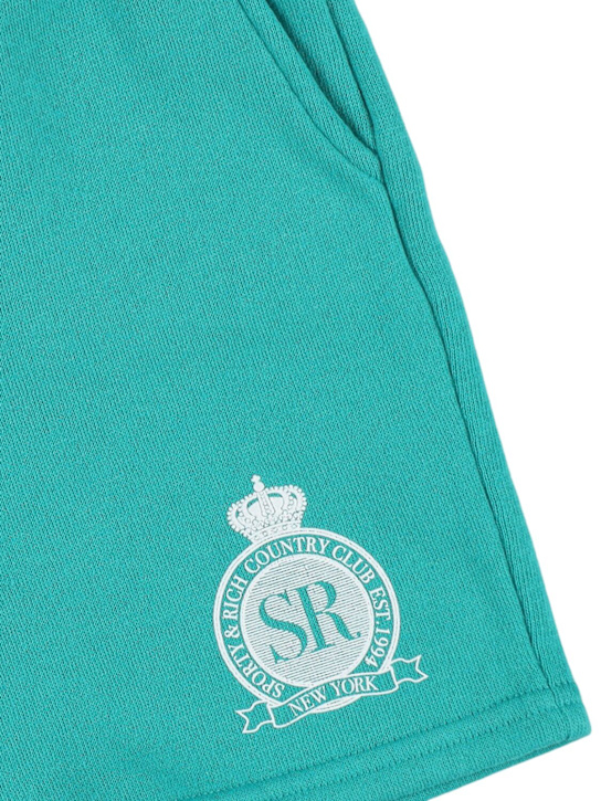 Sporty & Rich Royal Club printed cotton blend shorts
